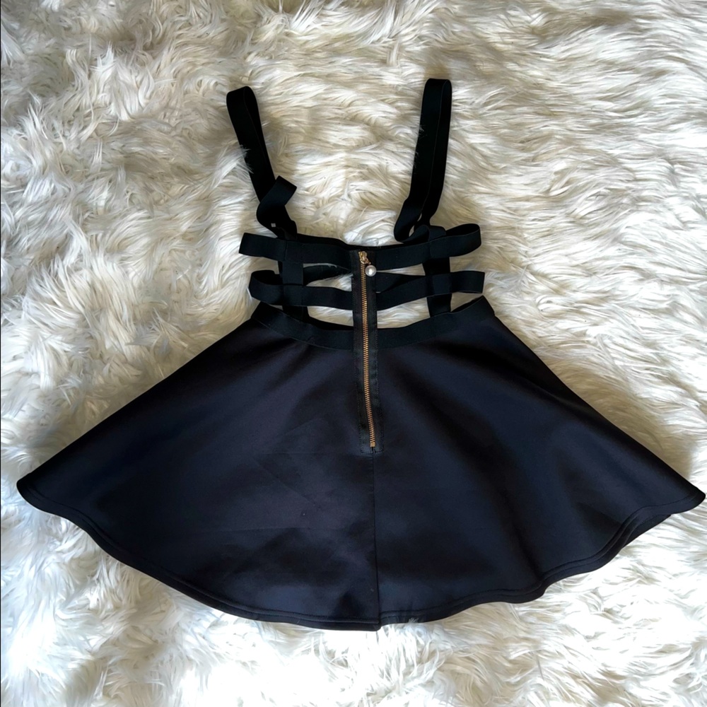 Urban CoCo Cage zip up skirt with pearl accent on zipper